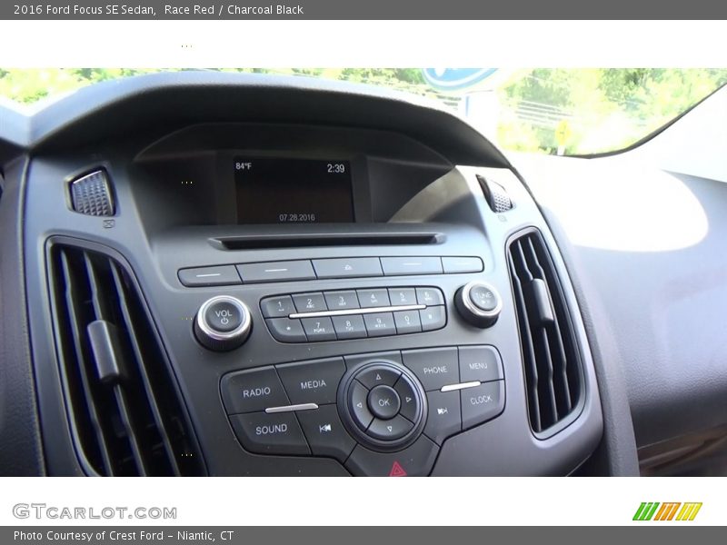 Race Red / Charcoal Black 2016 Ford Focus SE Sedan