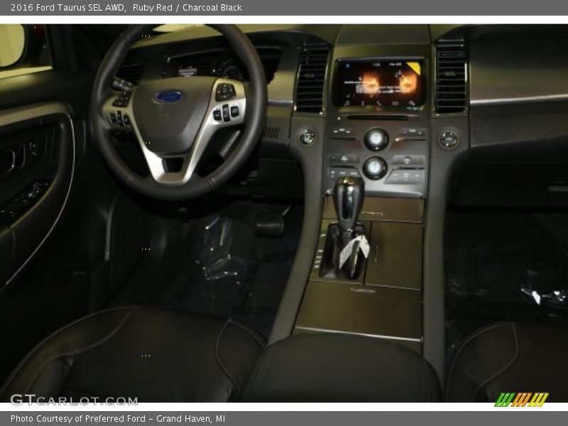 Ruby Red / Charcoal Black 2016 Ford Taurus SEL AWD