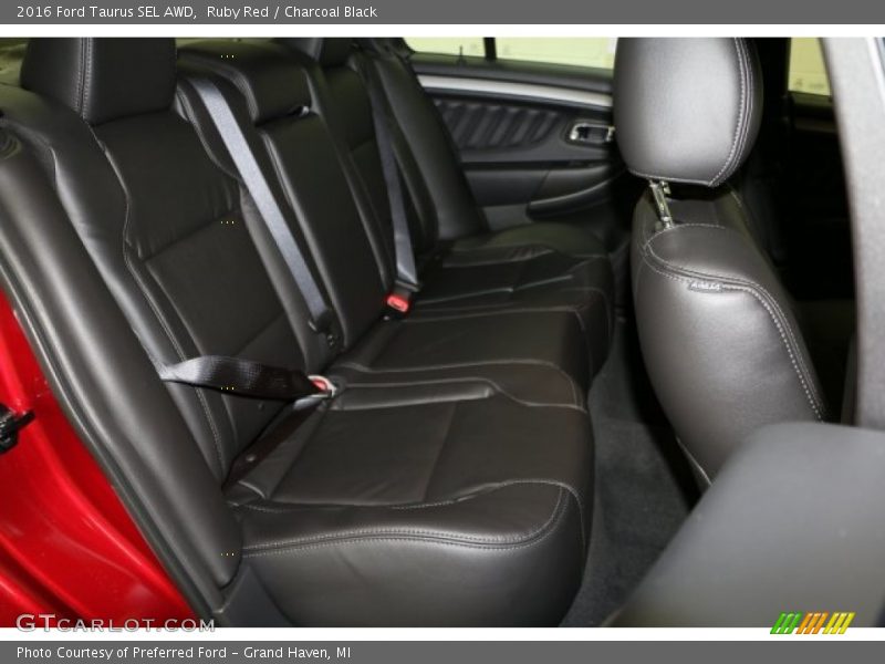 Ruby Red / Charcoal Black 2016 Ford Taurus SEL AWD