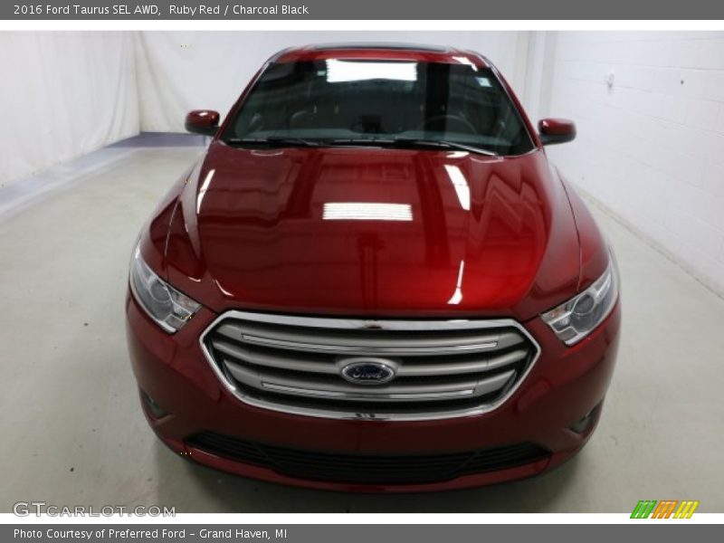 Ruby Red / Charcoal Black 2016 Ford Taurus SEL AWD