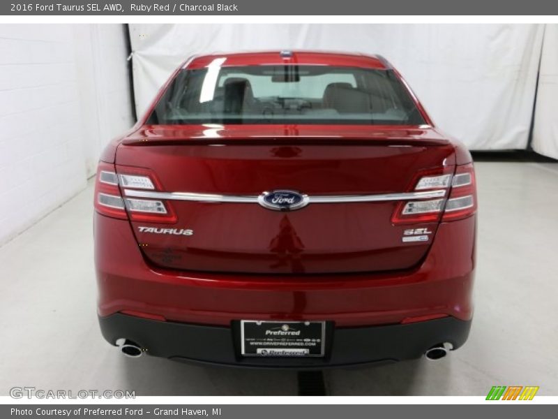 Ruby Red / Charcoal Black 2016 Ford Taurus SEL AWD