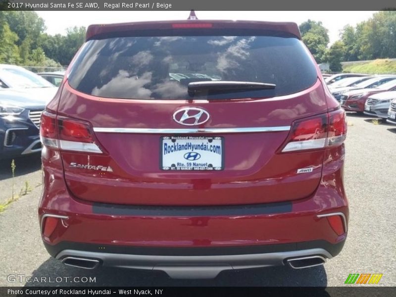 Regal Red Pearl / Beige 2017 Hyundai Santa Fe SE AWD