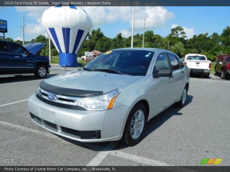 Ingot Silver Metallic / Medium Stone 2010 Ford Focus SE Sedan