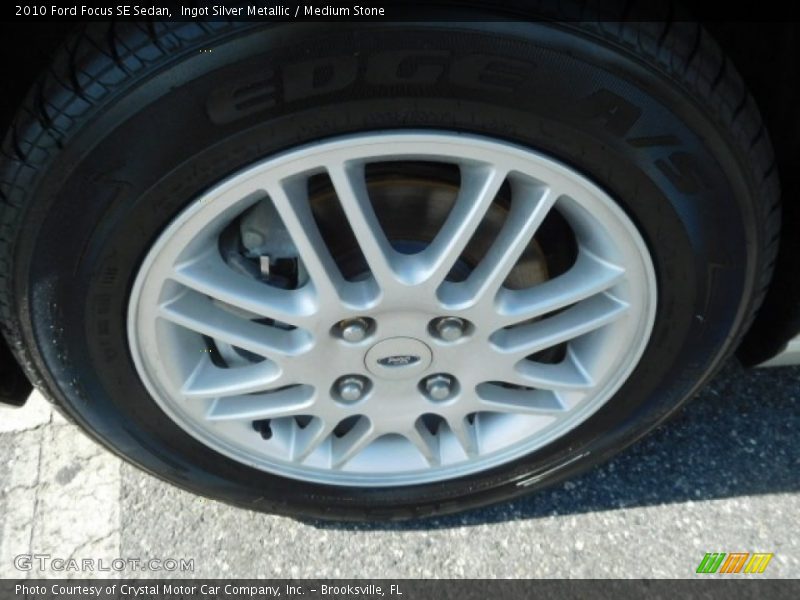 Ingot Silver Metallic / Medium Stone 2010 Ford Focus SE Sedan