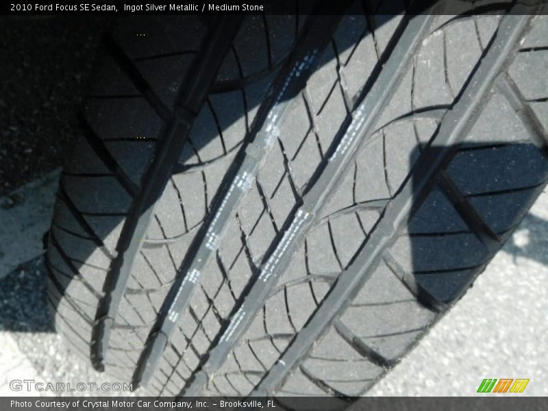 Ingot Silver Metallic / Medium Stone 2010 Ford Focus SE Sedan