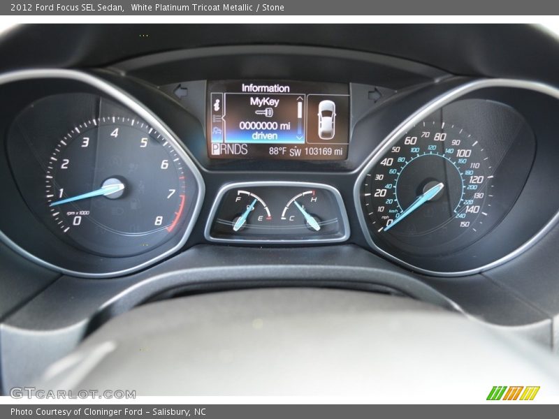 White Platinum Tricoat Metallic / Stone 2012 Ford Focus SEL Sedan