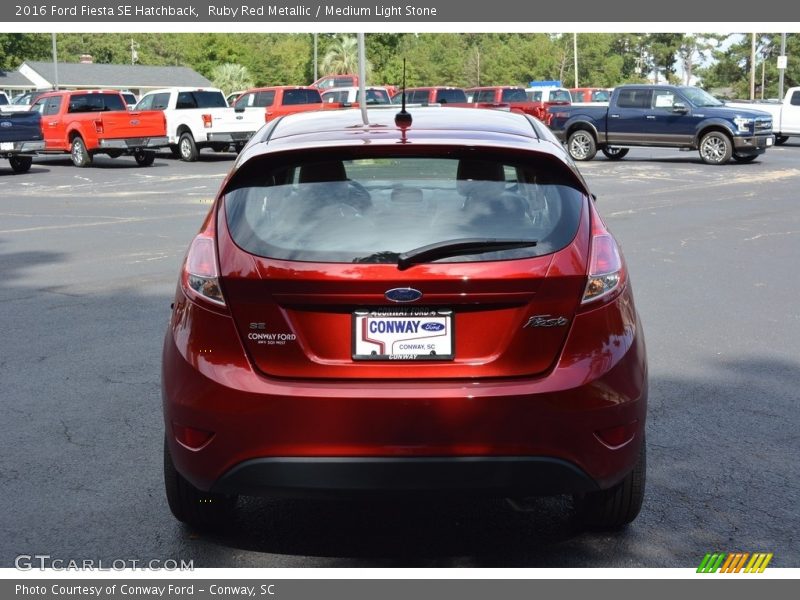 Ruby Red Metallic / Medium Light Stone 2016 Ford Fiesta SE Hatchback