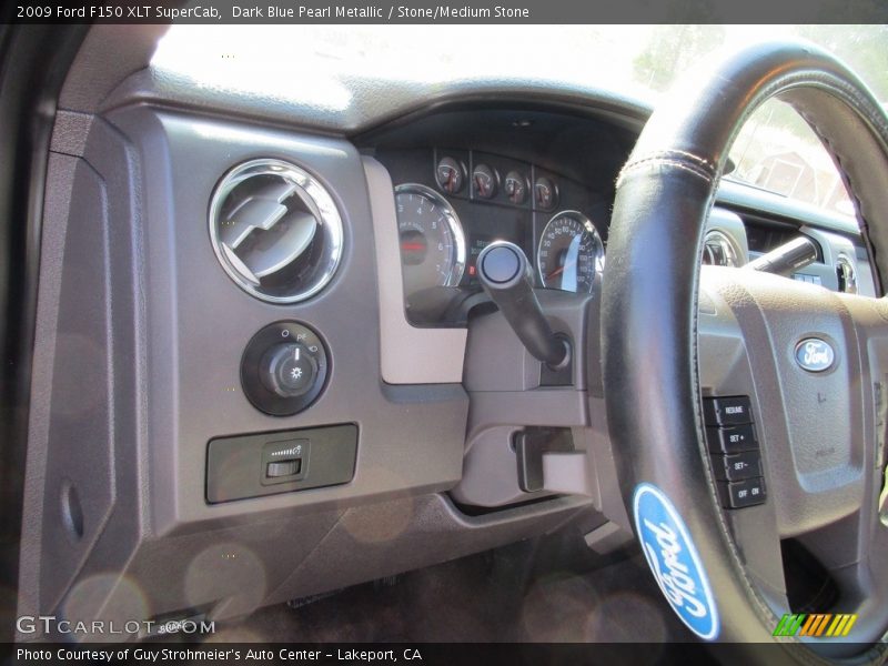 Dark Blue Pearl Metallic / Stone/Medium Stone 2009 Ford F150 XLT SuperCab