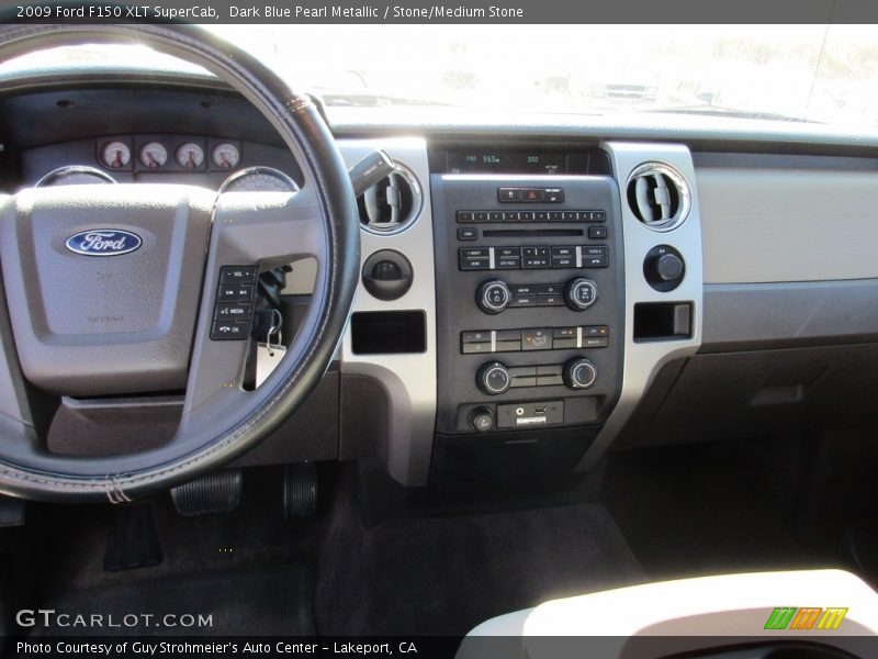 Dark Blue Pearl Metallic / Stone/Medium Stone 2009 Ford F150 XLT SuperCab