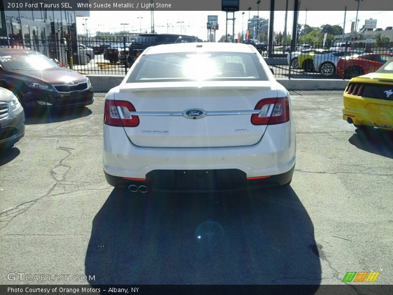 White Suede Metallic / Light Stone 2010 Ford Taurus SEL