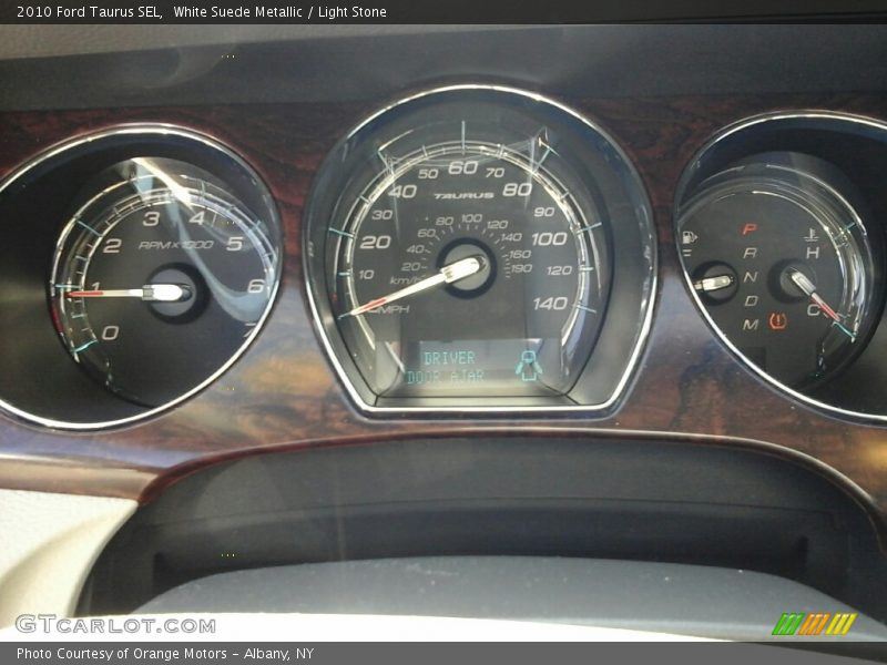 White Suede Metallic / Light Stone 2010 Ford Taurus SEL