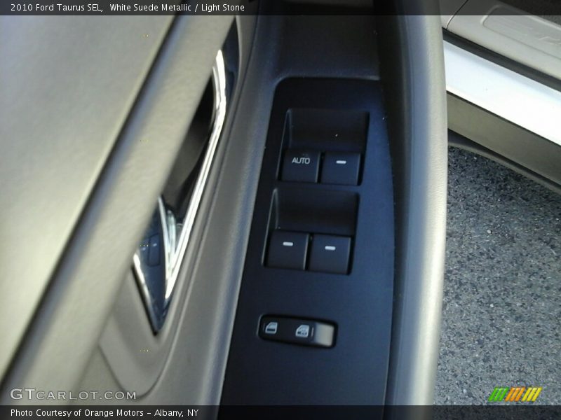 White Suede Metallic / Light Stone 2010 Ford Taurus SEL