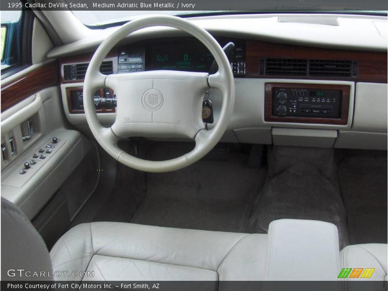 Medium Adriatic Blue Metallic / Ivory 1995 Cadillac DeVille Sedan