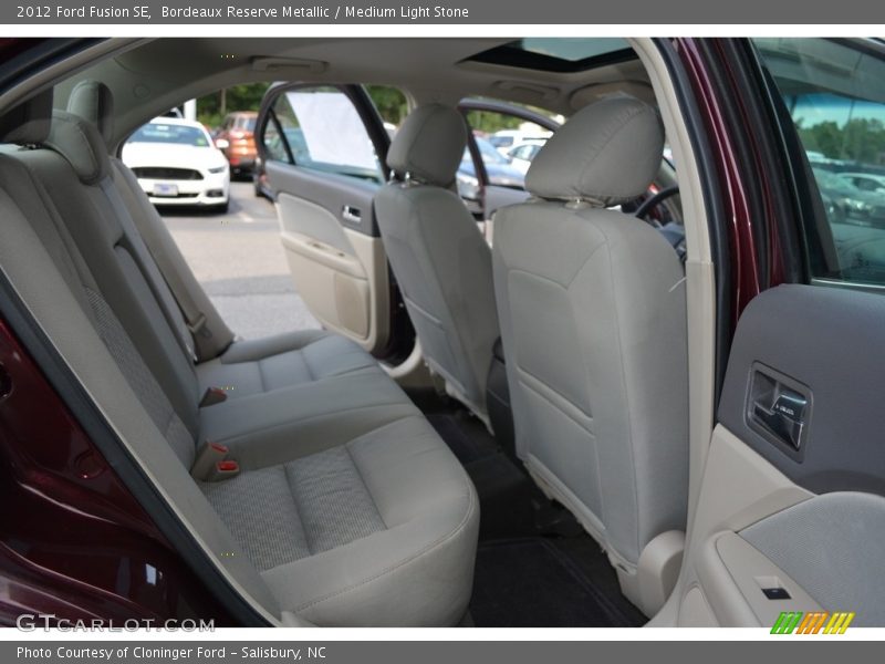 Bordeaux Reserve Metallic / Medium Light Stone 2012 Ford Fusion SE
