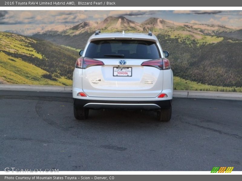 Blizzard Pearl / Black 2016 Toyota RAV4 Limited Hybrid AWD