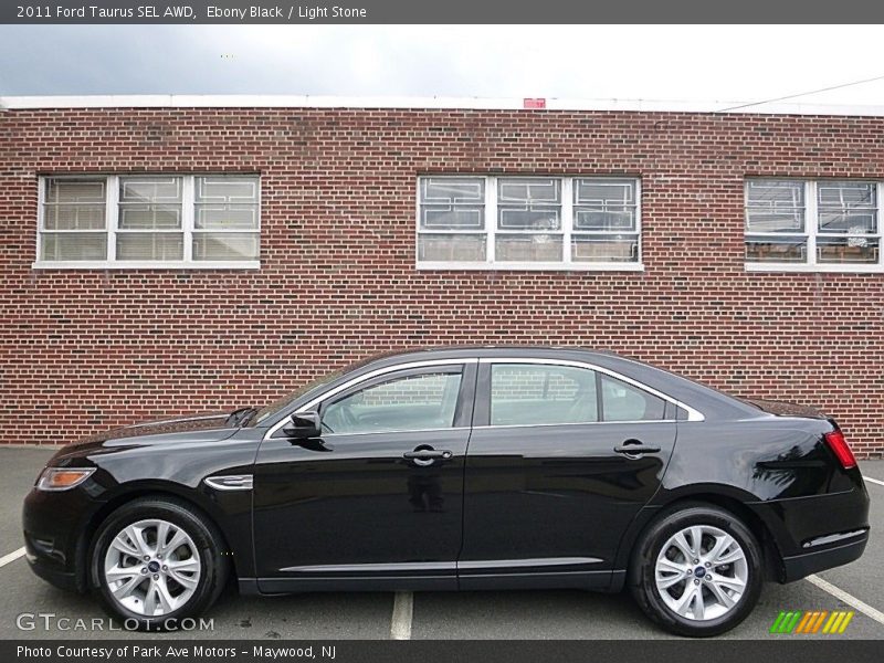Ebony Black / Light Stone 2011 Ford Taurus SEL AWD