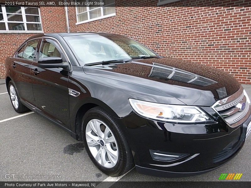 Ebony Black / Light Stone 2011 Ford Taurus SEL AWD