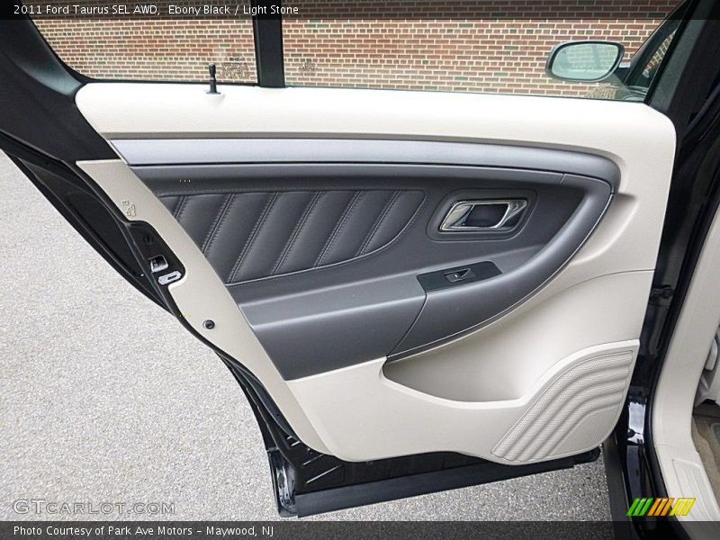 Ebony Black / Light Stone 2011 Ford Taurus SEL AWD