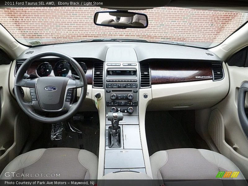 Ebony Black / Light Stone 2011 Ford Taurus SEL AWD