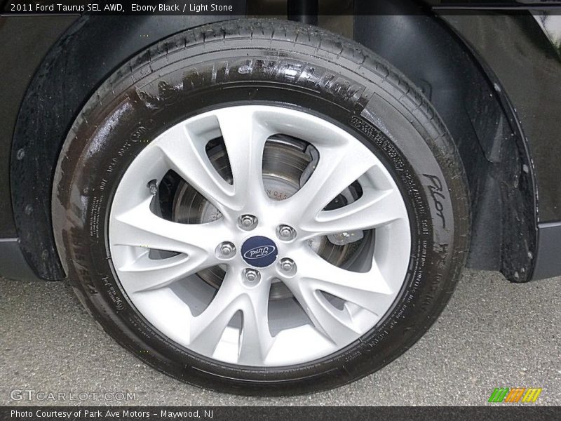 Ebony Black / Light Stone 2011 Ford Taurus SEL AWD