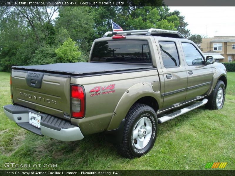 Gold Rush Metallic / Black 2001 Nissan Frontier SE V6 Crew Cab 4x4