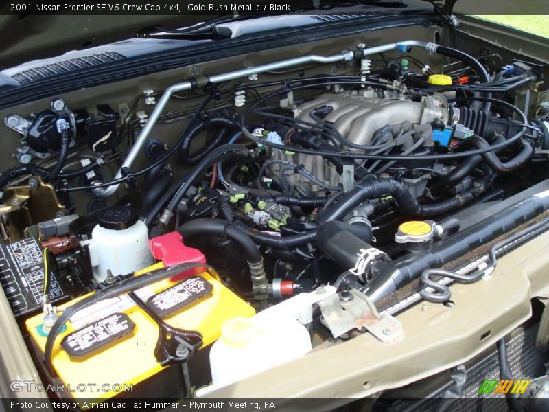 Gold Rush Metallic / Black 2001 Nissan Frontier SE V6 Crew Cab 4x4