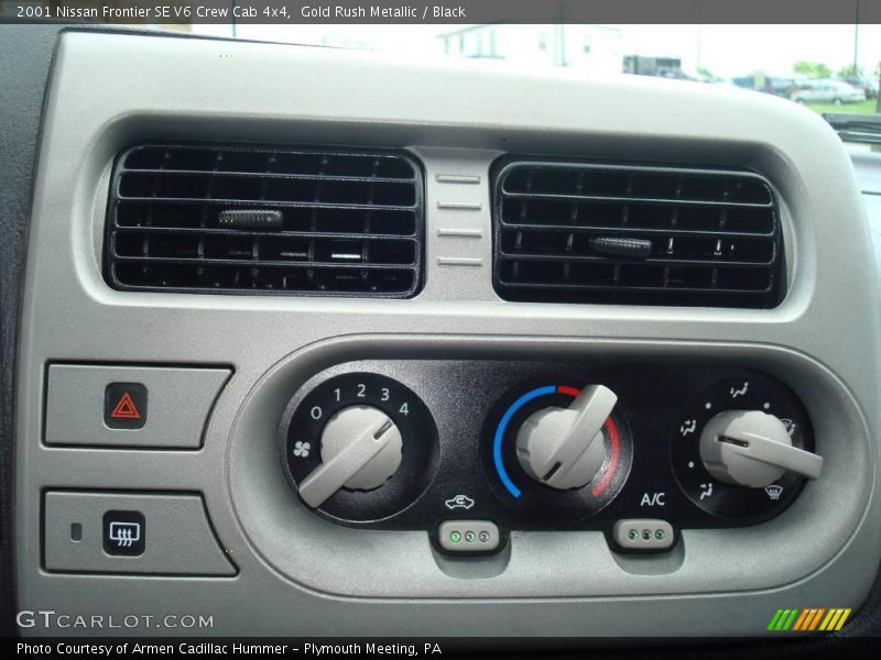 Gold Rush Metallic / Black 2001 Nissan Frontier SE V6 Crew Cab 4x4