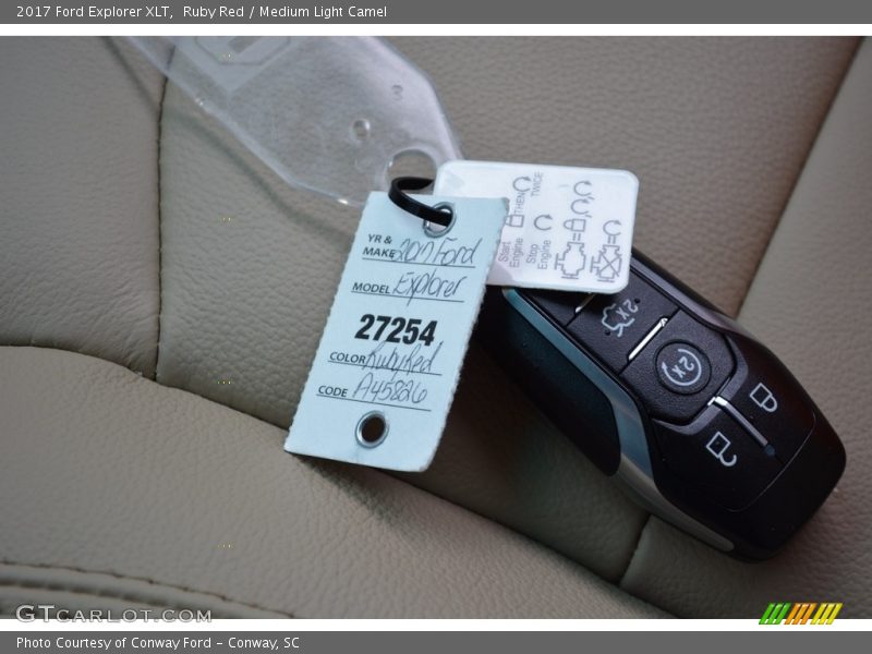 Ruby Red / Medium Light Camel 2017 Ford Explorer XLT