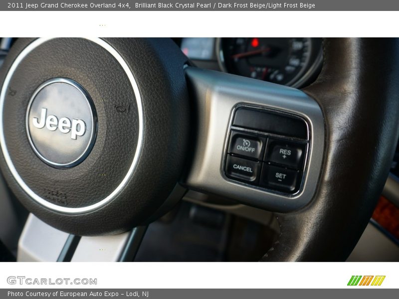 Brilliant Black Crystal Pearl / Dark Frost Beige/Light Frost Beige 2011 Jeep Grand Cherokee Overland 4x4