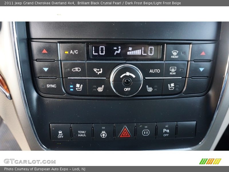 Brilliant Black Crystal Pearl / Dark Frost Beige/Light Frost Beige 2011 Jeep Grand Cherokee Overland 4x4
