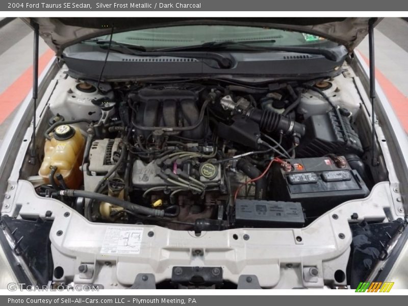 Silver Frost Metallic / Dark Charcoal 2004 Ford Taurus SE Sedan