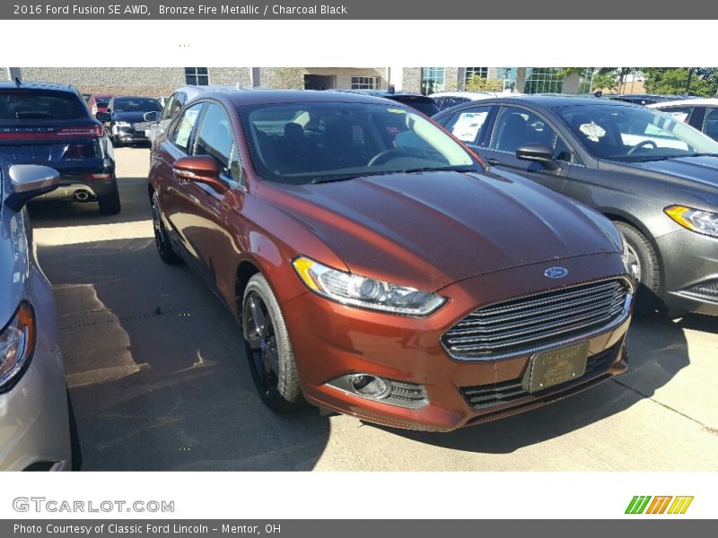 Bronze Fire Metallic / Charcoal Black 2016 Ford Fusion SE AWD