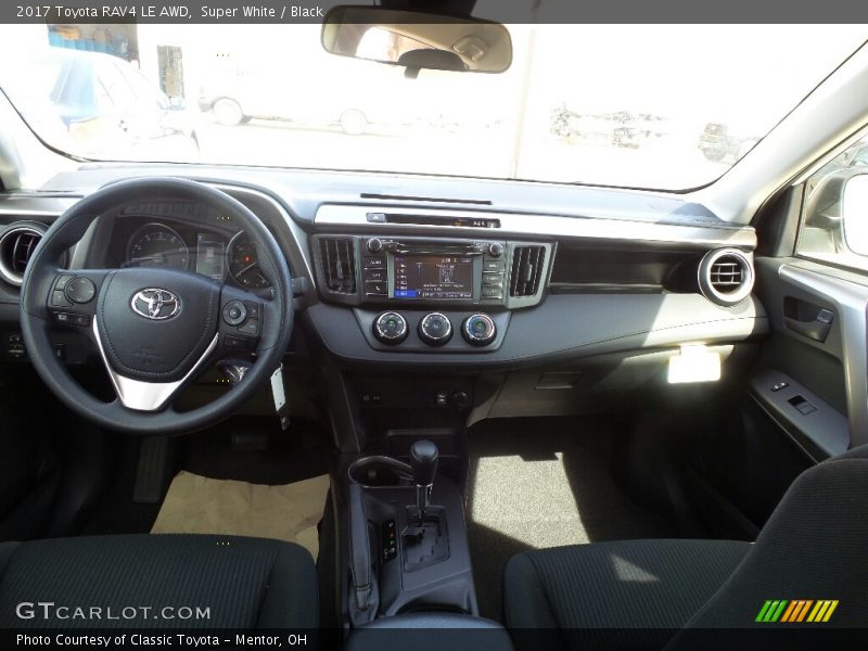 Super White / Black 2017 Toyota RAV4 LE AWD
