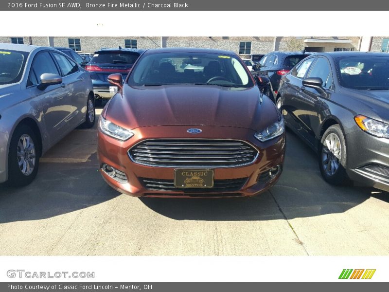 Bronze Fire Metallic / Charcoal Black 2016 Ford Fusion SE AWD