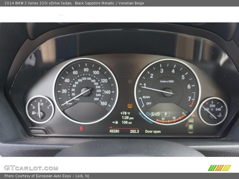 Black Sapphire Metallic / Venetian Beige 2014 BMW 3 Series 320i xDrive Sedan