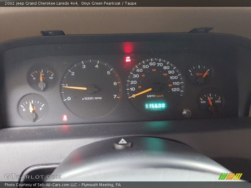 Onyx Green Pearlcoat / Taupe 2002 Jeep Grand Cherokee Laredo 4x4
