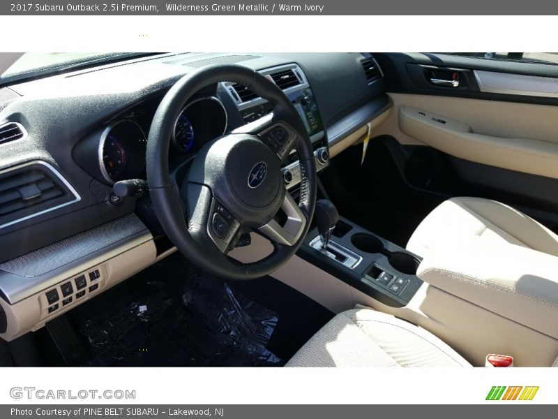 Wilderness Green Metallic / Warm Ivory 2017 Subaru Outback 2.5i Premium