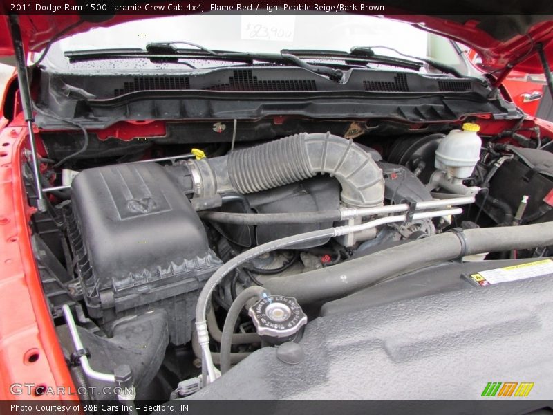 Flame Red / Light Pebble Beige/Bark Brown 2011 Dodge Ram 1500 Laramie Crew Cab 4x4