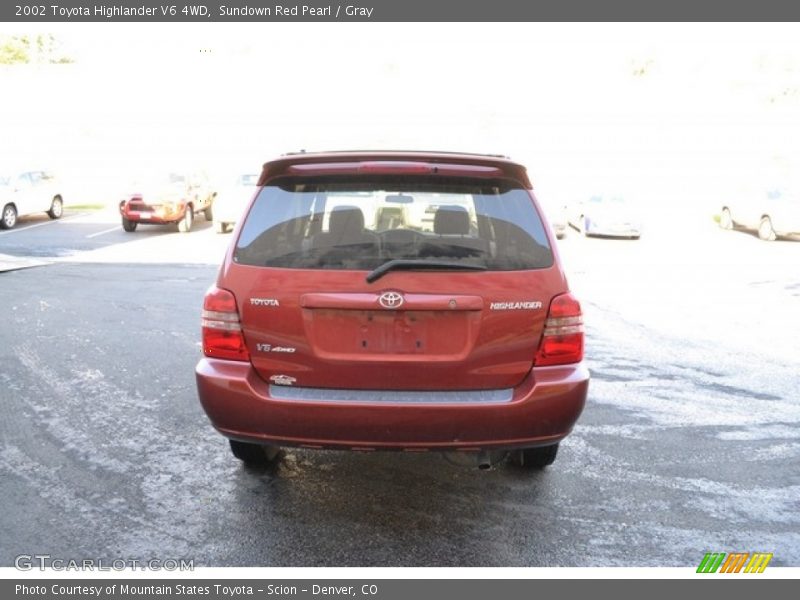 Sundown Red Pearl / Gray 2002 Toyota Highlander V6 4WD