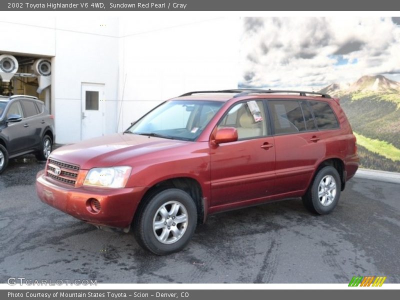 Sundown Red Pearl / Gray 2002 Toyota Highlander V6 4WD