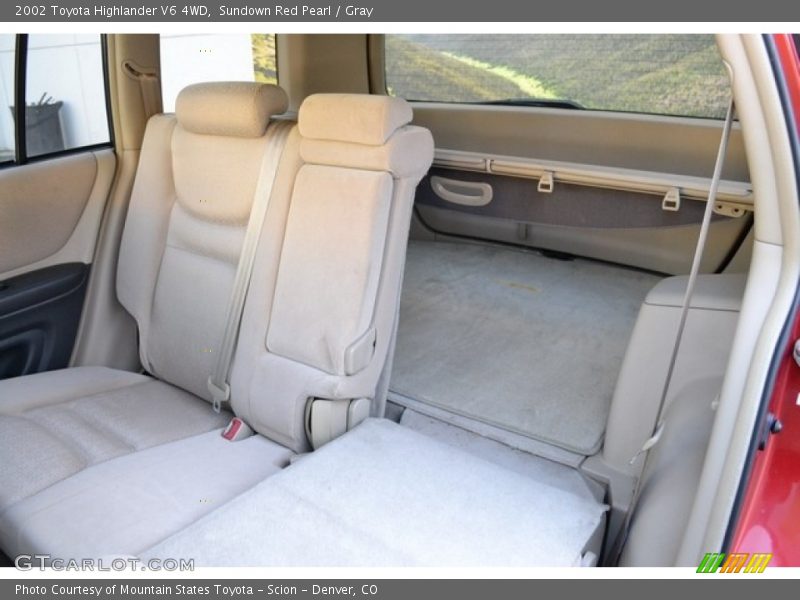 Sundown Red Pearl / Gray 2002 Toyota Highlander V6 4WD