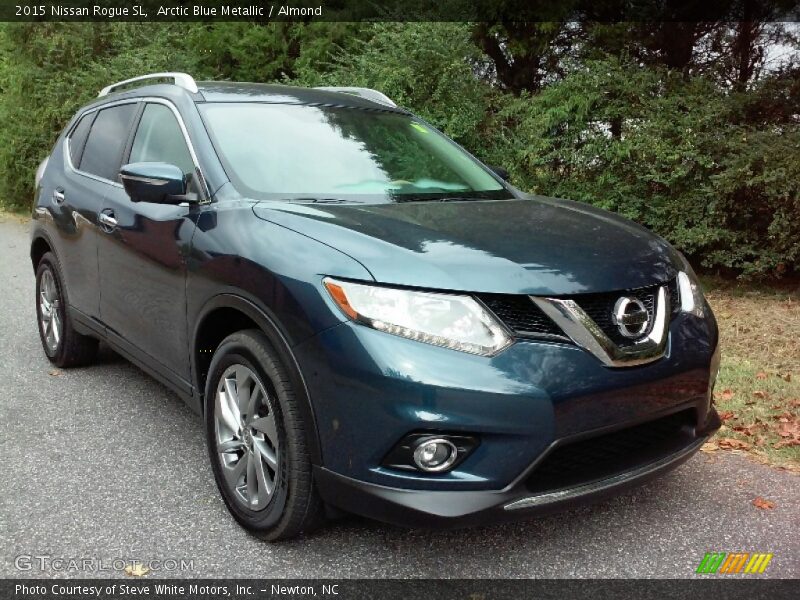 Arctic Blue Metallic / Almond 2015 Nissan Rogue SL