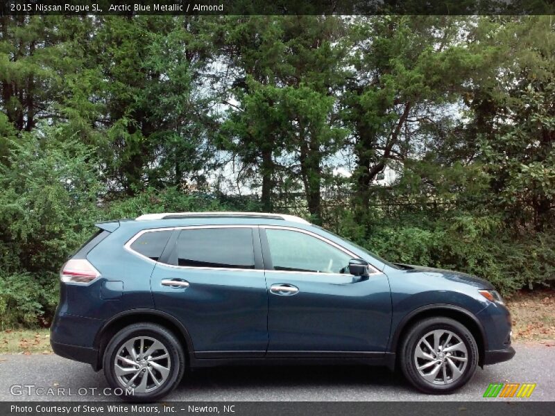 Arctic Blue Metallic / Almond 2015 Nissan Rogue SL