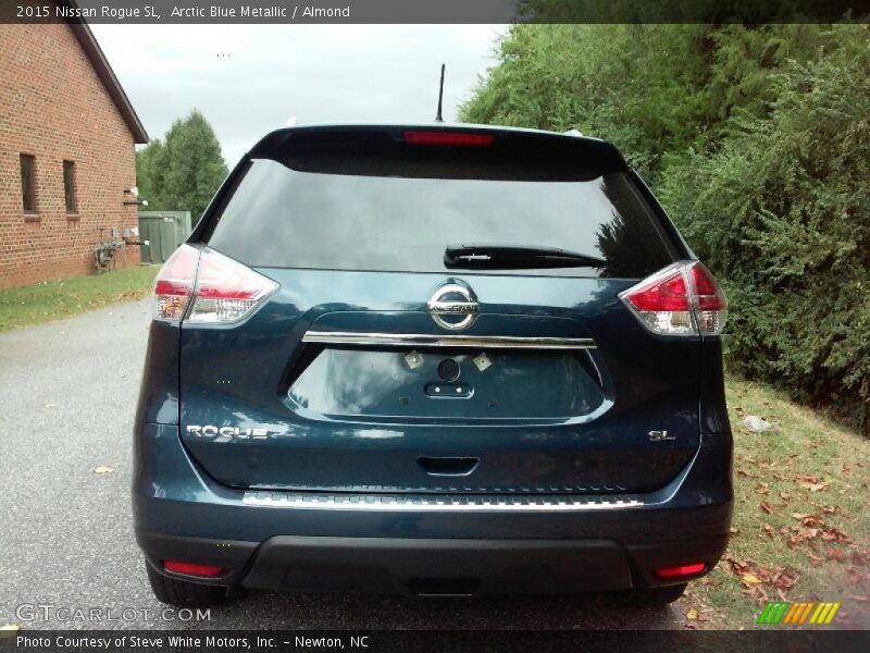 Arctic Blue Metallic / Almond 2015 Nissan Rogue SL