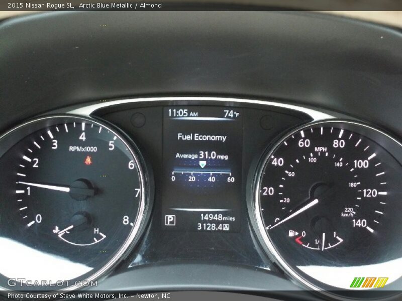 Arctic Blue Metallic / Almond 2015 Nissan Rogue SL