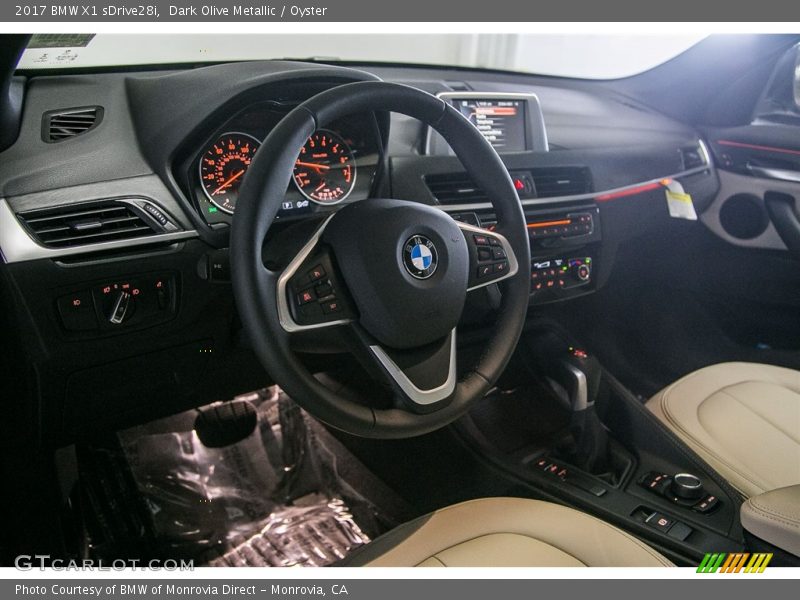 Dark Olive Metallic / Oyster 2017 BMW X1 sDrive28i