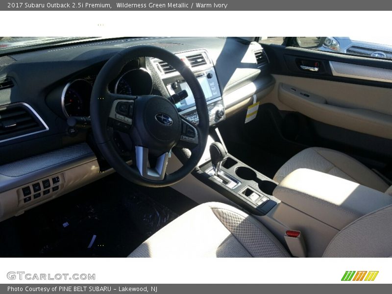 Wilderness Green Metallic / Warm Ivory 2017 Subaru Outback 2.5i Premium