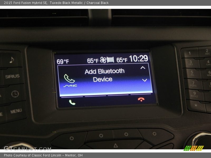 Tuxedo Black Metallic / Charcoal Black 2015 Ford Fusion Hybrid SE