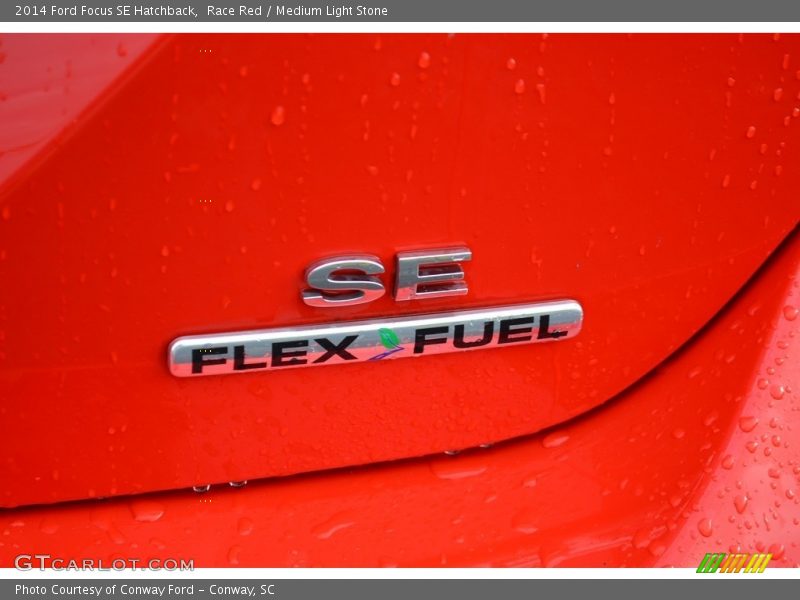 Race Red / Medium Light Stone 2014 Ford Focus SE Hatchback