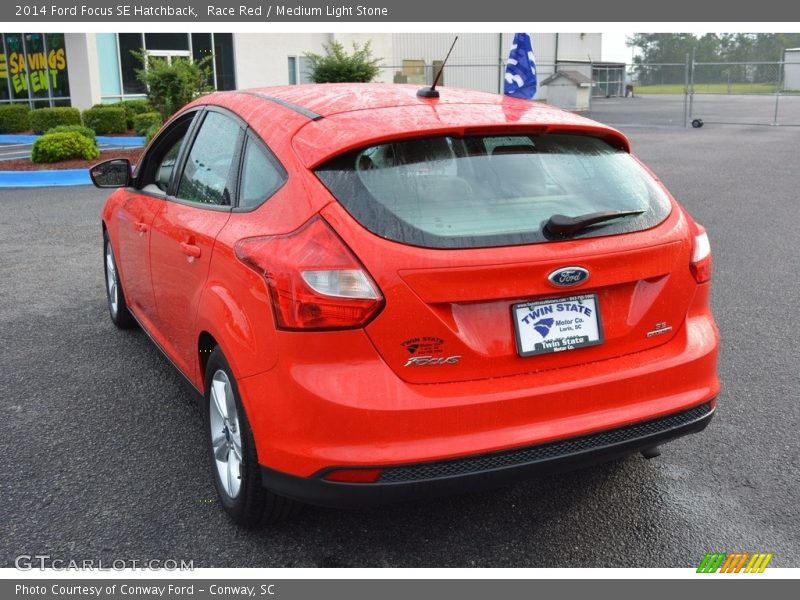 Race Red / Medium Light Stone 2014 Ford Focus SE Hatchback